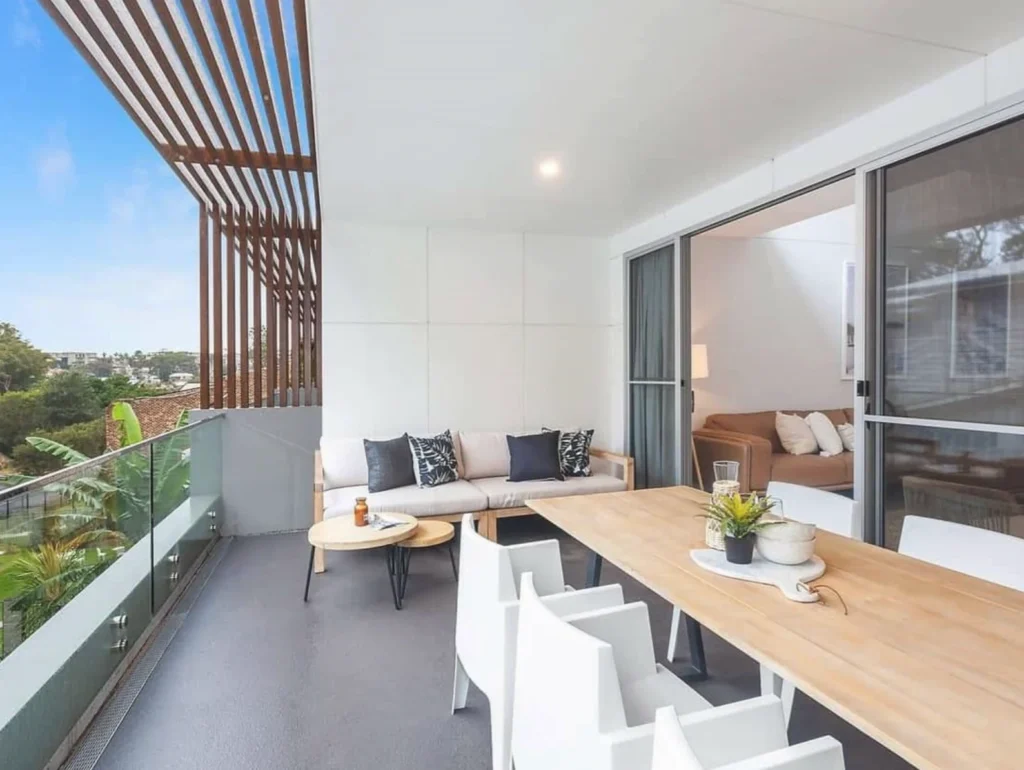 Covered terrace and outdoor living area in the Riverview Drive project imagery